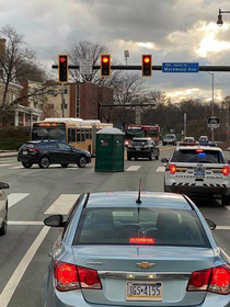 A wind storm blew a porto-potty into an intersection in Pittsburgh PA today