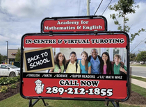 Academy of English sign offering turoting