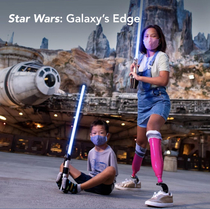 Ad currently on Disney World site Promoting diversity or lightsaber safety