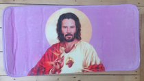 All I need in life is Keanu Reeves as Jesus in bath mat form