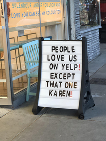 amusing sign outside a local ice cream shop