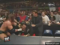 Arnold bitch-slapping Triple H