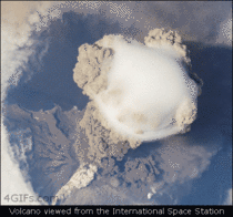Astronaut view of an erupting volcano