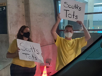 At the airport and these guys came out with signs