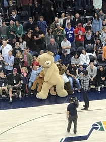 At the Utah Jazz game tonight the Jazz Bear kept bringing big stuffed bears to a lady on the front row He then brought out a giant ass bear and throw it on her