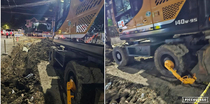 Backhoe parks around and finds out