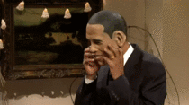 Barack Obama Wearing a Barack Obama Mask