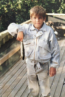 Before he was Deadpool Ryan Reynolds in  Double denim holding a dead fish with his fly open