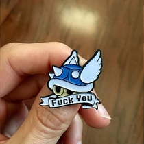 Blue shell pin badge Saying it how it is