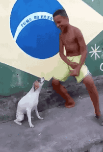 Brazilian kid dancing with his dog