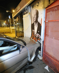 Bruce Willis crushes a BMW with his six-pack