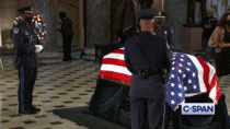 Bryant Johnson Ruth Bader Ginsburgs personal trainer does push-ups in front of her casket to pay his respects