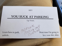Business card my wife got after accidentally parking in motorcycle only parking spot At least I got a hearty laugh