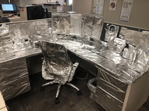 Came back from a long vacation to literally every single thing on my desk wrapped in tin foil