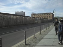 Can we all just take a moment to appreciate the Irony that the Berlin wall now has a fence to protect it
