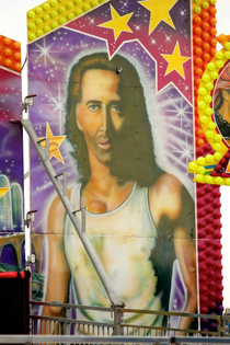 Carnival ride rendition of Nick Cage