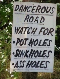 Caution Dangerous Road