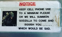 Cell phone use warning at the sushi bar