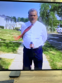 Channel  News pulling off a hands free mic