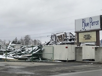 Clever sign for a burned down strip club