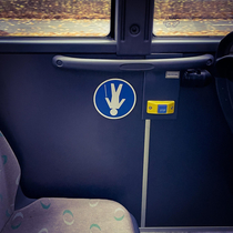 Cool My local buss has a seat for people who practise yoga
