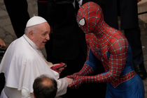 Costumed man who claims to have special powers meets Spiderman