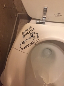 Dads toilet seat cracked and it bit him in the butt He put this warning up for others