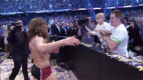 Daniel Bryan hugs sick child fan at the end of Wrestlemania