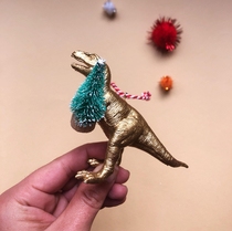 Dinosaurs for Christmas decorations because its 