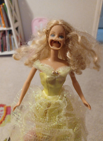 dog chewed on daughters old Barbies and created
