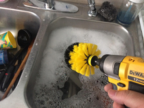 Doing dishes the most dad way possible