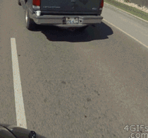 Driver Mugged By A Passing Motorcyclist