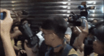 During Hong Kongs protest around the Police Headquarter a police disguised as a protestor and urged others to charge inside the building which could lead to a life sentence His identity was discovered when he was being escorted back into the building 