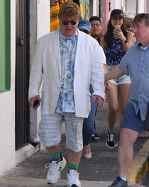 Elton John is evolving to Chris Farley