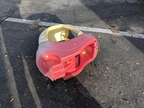 Even the wheels on fake cars get jacked in this neighborhood