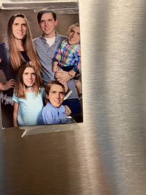 Every year me and my coworker always troll each other This year I printed wallet sized family photos for the whole team