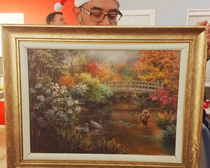 Every year my friends have a White ElephantGag Gift Christmas Party This year I gave a generic thrift store painting with a few things I added