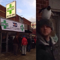 Everybodys out buying their legal weed and this guys just standing here with a penguin on his head