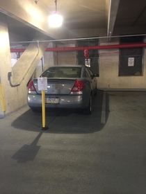 Everyday this car parks in the motorcycle spots Clearly they struggle with reading I moved the sign so they can see it easier