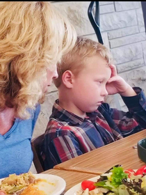 Exact moment of my mom telling my nephew he couldnt have cake until he ate his veggies