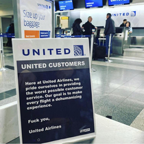 Fake United signs posted at the airport TGLNYC on IG
