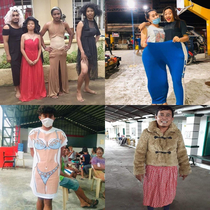 Filipinos at the Taal Volcano evacuation center staying positive by trying on some of the clothes that had been donated to them