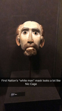 First Nations White Man mask looks a lot like Nic Cage 