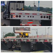 Flat bed tractor trailer carrying a dumptruck