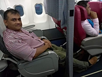 Flying premium economy - torso in economy legs in business class