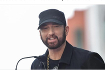 For years I thought Eminem looked like a moron for never smiling I stand corrected