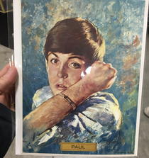 Found a painting of Paul McCartney dodging a punch I think