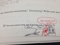 Friend of mines math teacher responds to a doodle he drew on his test