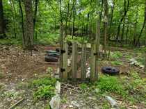 Gate with no fence Good thing its locked you wouldnt want anyone coming in to wreck the garden