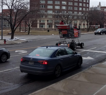 Giant shopping cart drives through Downtown KC MO